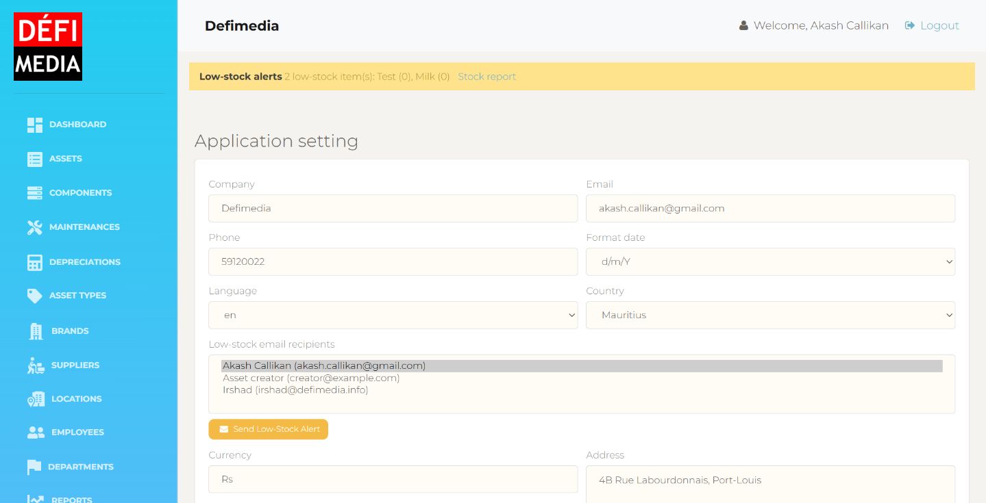 Settings page with low-stock email recipients and send low-stock alert button